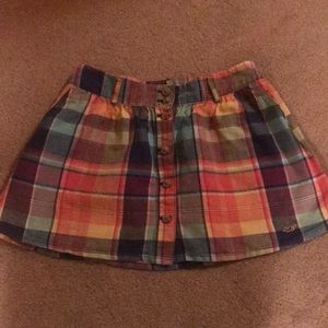 Plaid button down mini skirt